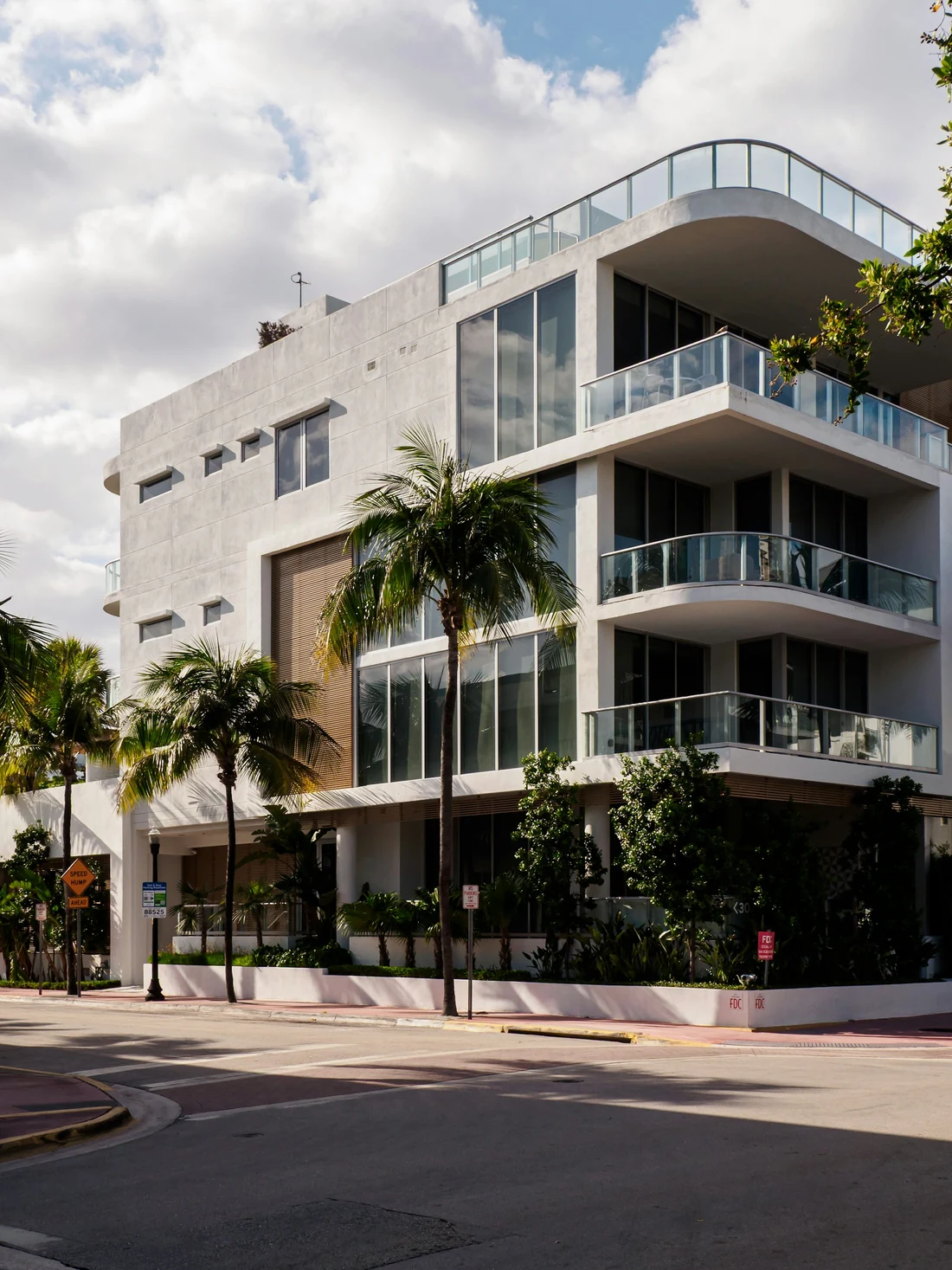 Modern apartment residences with balconies and landscaped surroundings